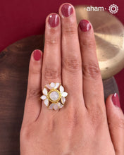 Embrace the allure of timeless elegance with Aham Jewellery’s latest Mother of Pearl collection, a radiant choice for festive celebrations and weddings.The ring is crafted in 92.5 silver and adorned with a luxurious gold polish, capturing the iridescent beauty of mother of pearl.This collection is designed with festivities, bridesmaids, and destination weddings in mind, offering a versatile blend of tradition and contemporary charm. 