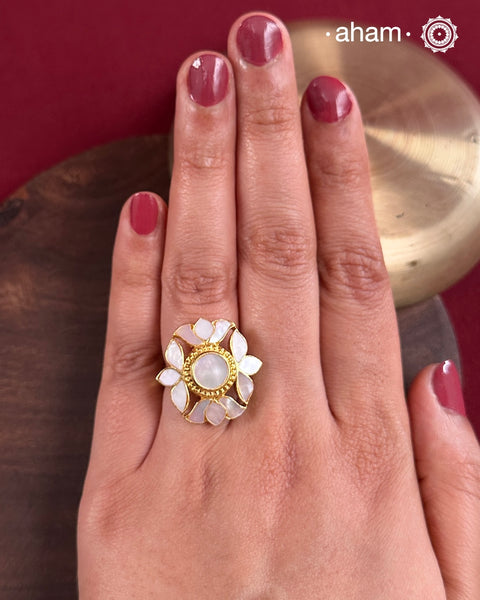 Embrace the allure of timeless elegance with Aham Jewellery’s latest Mother of Pearl collection, a radiant choice for festive celebrations and weddings.The ring is crafted in 92.5 silver and adorned with a luxurious gold polish, capturing the iridescent beauty of mother of pearl.This collection is designed with festivities, bridesmaids, and destination weddings in mind, offering a versatile blend of tradition and contemporary charm. 