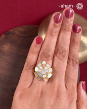 Embrace the allure of timeless elegance with Aham Jewellery’s latest Mother of Pearl collection, a radiant choice for festive celebrations and weddings.
The ring is crafted in 92.5 silver and adorned with a luxurious gold polish, capturing the iridescent beauty of mother of pearl.This collection is designed with festivities, bridesmaids, and destination weddings in mind, offering a versatile blend of tradition and contemporary charm. Ideal for those seeking an ethereal statement, our Mother of Pear