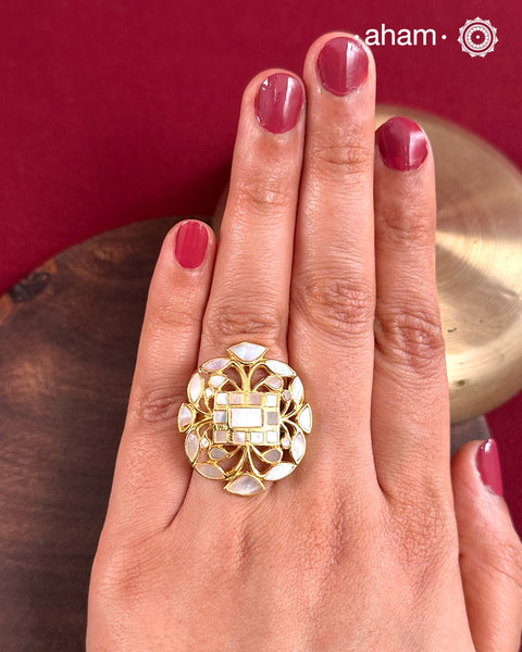 Embrace the allure of timeless elegance with Aham Jewellery’s latest Mother of Pearl collection, a radiant choice for festive celebrations and weddings.
The ring is crafted in 92.5 silver and adorned with a luxurious gold polish, capturing the iridescent beauty of mother of pearl.This collection is designed with festivities, bridesmaids, and destination weddings in mind, offering a versatile blend of tradition and contemporary charm. 