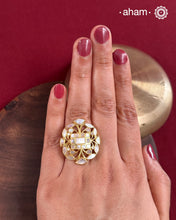 Embrace the allure of timeless elegance with Aham Jewellery’s latest Mother of Pearl collection, a radiant choice for festive celebrations and weddings.
The ring is crafted in 92.5 silver and adorned with a luxurious gold polish, capturing the iridescent beauty of mother of pearl.This collection is designed with festivities, bridesmaids, and destination weddings in mind, offering a versatile blend of tradition and contemporary charm. 