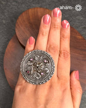 A vintage Haathphool center piece has been converted into an adjustable ring. Crafted in silver.