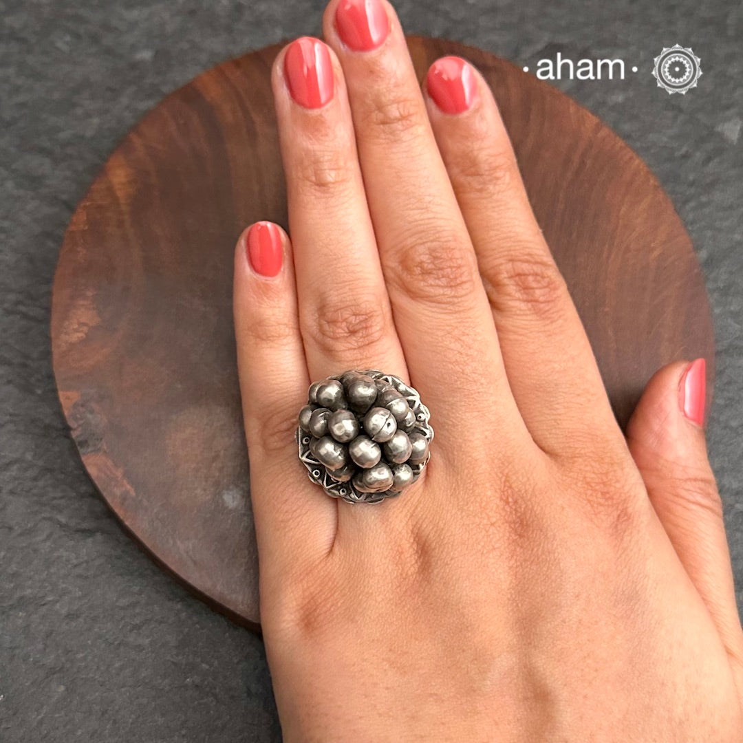 Tribal silver adjustable ring with a bunch of ghungroos.Perfect to pair with your ethnic clothing.