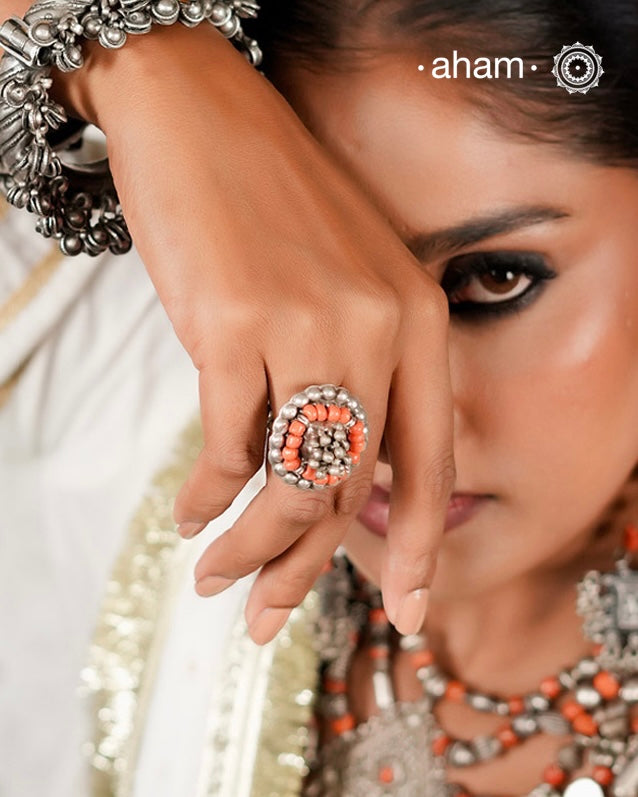 Tribal silver adjustable ring with coral and bunch of ghungroos. Perfect to pair with your ethnic clothing