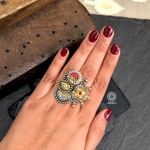 Noori two tone adjustable ring with birds motif. Handcrafted in 92.5 sterling silver with hints of gold polish, pearls and kundan work.  Perfect to match your Indian or fusion outfit. 