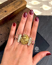 Stunnng Noori two tone adjustable ring with a beautiful peacock center and kundan highlights. Handcrafted in 92.5 sterling silver with dual tones. 
