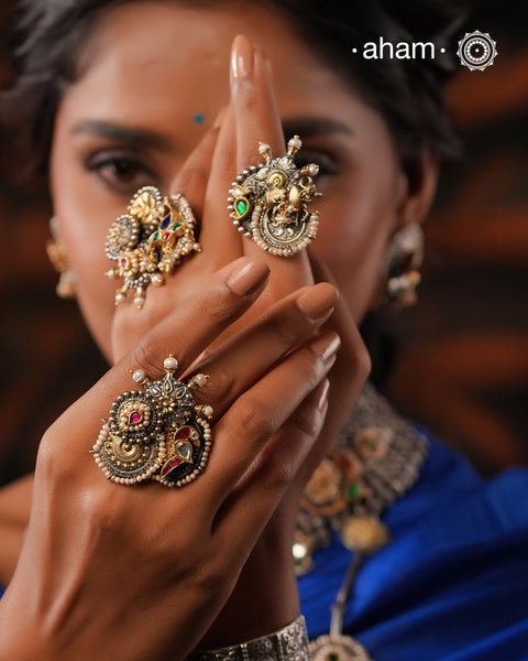 Noori two tone ring handcrafted in 92.5 sterling silver with a beautiful kundan bird motif. Handcrafted in 92.5 sterling silver with hints of gold polish and pearls. Perfect to match your Indian or fusion outfit. 