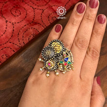 Noori two tone ring handcrafted in 92.5 sterling silver with a beautiful kundan peacock motif. Handcrafted in 92.5 sterling silver with hints of gold polish and pearls. Perfect to match your Indian or fusion outfit.