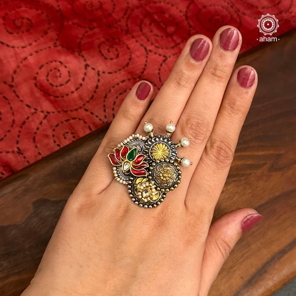 Noori two tone ring handcrafted in 92.5 sterling silver with a beautiful kundan lotus motif.  Handcrafted in 92.5 sterling silver with hints of gold polish and pearls.  Perfect to match your Indian or fusion outfit.