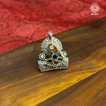 Noori two tone ring handcrafted in 92.5 sterling silver with a beautiful kundan peacock motif.  Handcrafted in 92.5 sterling silver with hints of gold polish and pearls.  Perfect to match your Indian or fusion outfit.