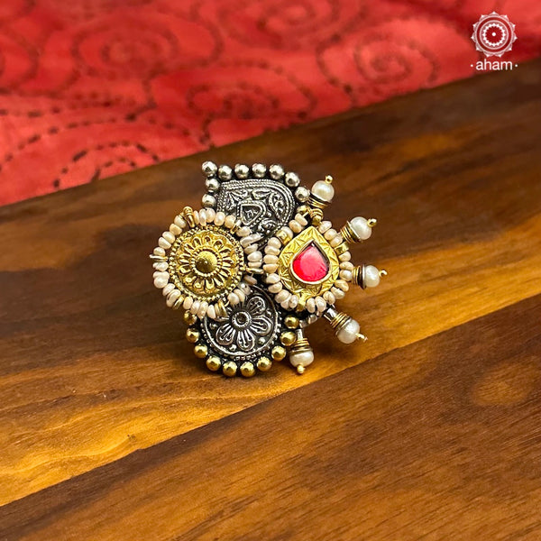 Noori two tone adjustable ring with red kundan highlight. Handcrafted in 92.5 sterling silver with hints of gold polish and pearls.  Perfect to match your Indian or fusion outfit. 