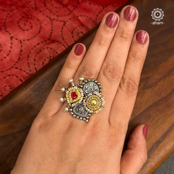 Noori two tone adjustable ring with red kundan highlight. Handcrafted in 92.5 sterling silver with hints of gold polish and pearls.  Perfect to match your Indian or fusion outfit. 