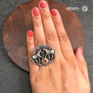 Noori two tone adjustable ring with Horse motif. Handcrafted in 92.5 sterling silver with hints of gold polish, pearls and kundan work.&nbsp; Perfect to match your Indian or fusion outfit.