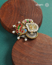 Noori two tone adjustable ring handcrafted in 92.5 sterling silver with hints of gold polish, pearls and kundan work.  Perfect to match your Indian or fusion outfit. 