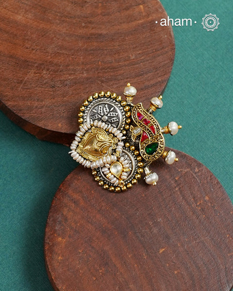 Noori two tone adjustable ring handcrafted in 92.5 sterling silver with hints of gold polish, pearls and kundan work.Perfect to match your Indian or fusion outfit.