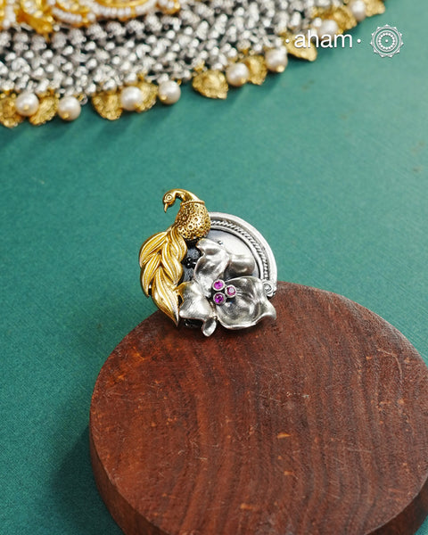 Noori two tone adjustable ring handcrafted in 92.5 sterling silver with hints of gold polish. Perfect to match your Indian or fusion outfit. 