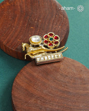 Noori two tone adjustable ring handcrafted in 92.5 sterling silver with hints of gold polish, and kundan work.  Perfect to match your Indian or fusion outfit. 