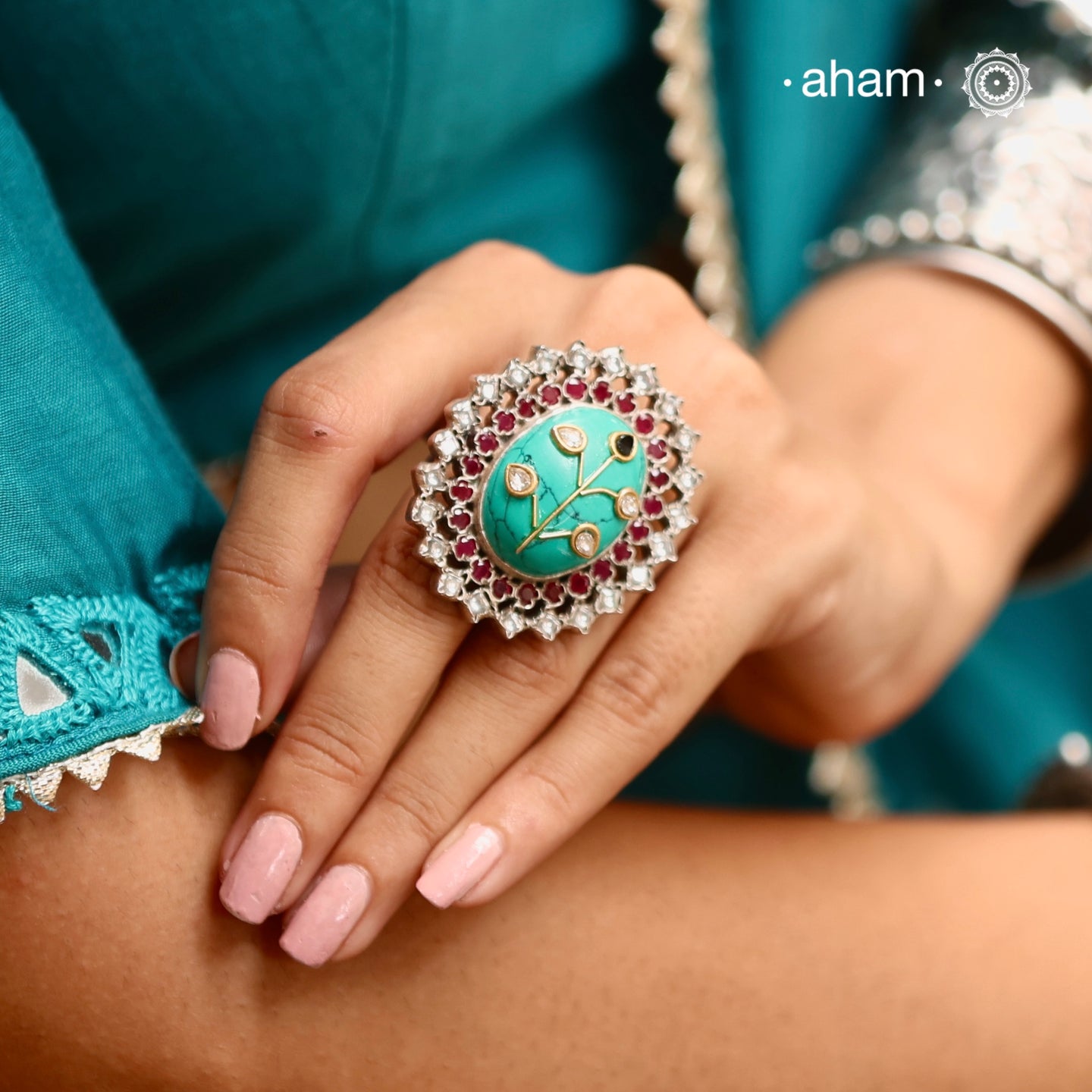 Ira adjustable ring, handcrafted intricately in 92.5 sterling silver with semi precious stone and Kundan work. Perfect for special occasions and festivities.