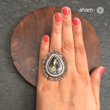 Ira adjustable ring, handcrafted intricately in 92.5 sterling silver with semi precious stone and Kundan work. Perfect for special occasions and festivities.