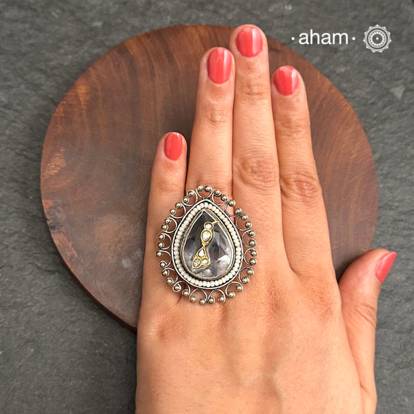 Ira adjustable ring, handcrafted intricately in 92.5 sterling silver with semi precious stone and Kundan work. Perfect for special occasions and festivities.