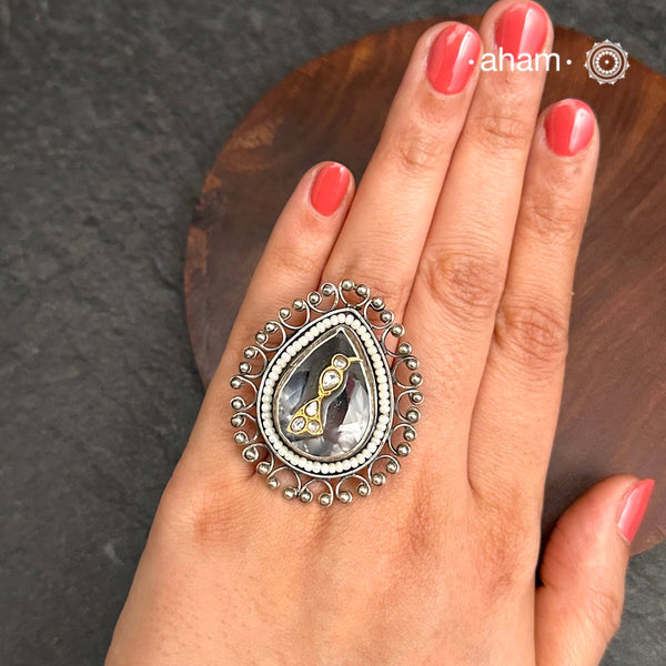 Ira adjustable ring, handcrafted intricately in 92.5 sterling silver with semi precious stone and Kundan work. Perfect for special occasions and festivities.