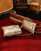 Handwoven 92.5 sterling silver sling bag. Perfect for festive occasions.
Carry your accessories in style.