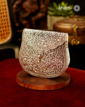 Handcrafted 92.5 sterling silver clutch with intricate floral carvings. Statement bags perfect for festive occasions, carry your accessories in style.