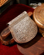 Handcrafted 92.5 sterling silver clutch with intricate floral carvings. Statement bags perfect for festive occasions, carry your accessories in style.