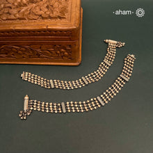 Dress your feet with these delicate and beautiful statement anklets. Crafted in silver with traditional artistry. Pair it with your anarkali, rajasthani jootis, and a potli bag to complete your look.