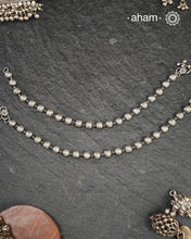 Dress your feet with these delicate and beautiful classic anklets. Crafted in silver with traditional artistry. Pair it with your anarkali, rajasthani jootis, and a potli bag to complete your look. Comes as a pair
