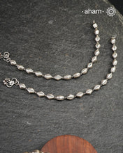 Dress your feet with these delicate and beautiful classic anklets. Crafted in silver with traditional artistry. Pair it with your anarkali, rajasthani jootis, and a potli bag to complete your look.