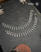 Dress your feet with these delicate and beautiful classic anklets. Crafted in silver with traditional artistry. Pair it with your anarkali, rajasthani jootis, and a potli bag to complete your look.