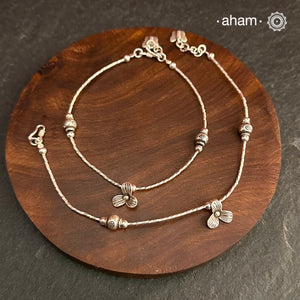 Versatile, fun, unmistakably you! Stunning silver anklet with little charms crafted in fine 92.5 silver. Dress your feet with these delicate and beautiful statement anklets.
The price is for a pair