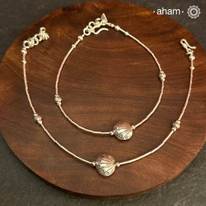 Versatile, fun, unmistakably you! Stunning silver anklet with little charms crafted in fine 92.5 silver. Dress your feet with these delicate and beautiful statement anklets.
The price is for a pair