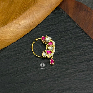 Beautiful clip on nath with fine kundan work, Crafted in silver with gold polish.
Sits on the left side of the nostril.