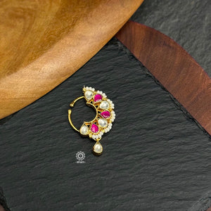 Beautiful clip on nath with fine kundan work, Crafted in silver with gold polish.
Sits on the left side of the nostril.