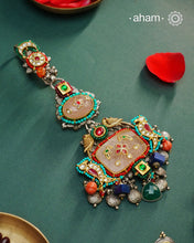 Challa/Juda/Chatka/ Guchha or waist key chains hold a special place in a woman’s trousseau, symbolizing tradition and elegance. The Noori Two Tone Silver Waist Key Ring features exquisite kundan work and carefully selected fine stones, all crafted in high-quality silver. This unique piece blends timeless craftsmanship with distinctive design, making it a meaningful accessory that complements your individuality.