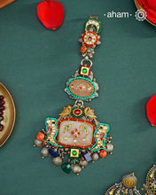 Challa/Juda/Chatka/ Guchha or waist key chains hold a special place in a woman’s trousseau, symbolizing tradition and elegance. The Noori Two Tone Silver Waist Key Ring features exquisite kundan work and carefully selected fine stones, all crafted in high-quality silver. This unique piece blends timeless craftsmanship with distinctive design, making it a meaningful accessory that complements your individuality.