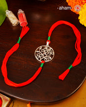 Beautiful Silver Rakhi 
Make this Rakshabandhan Memorable with this handcrafted 92.5 Silver Rakhi

Silver dial weaved with cotton thread for an ever-lasting Knot.