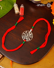 Beautiful Silver Rakhi 
Make this Rakshabandhan Memorable with this handcrafted 92.5 Silver Rakhi

Silver dial weaved with cotton thread for an ever-lasting Knot.