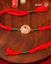 Make this Rakshabandhan Memorable with this handcrafted silver Rakhi. Elegant Rose Quartz Rakhi in 925 Silver with Gold Polish and beautiful inlay work.