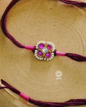 Beautiful Silver Rakhi. Make this Rakshabandhan Memorable with this handcrafted Rakhi for an ever-lasting Knot.Blessings of prosperity with Rakhi crafted in Silver Kundan work with cotton thread.