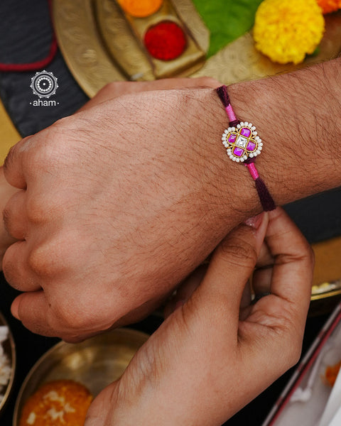 Beautiful Silver Rakhi. Make this Rakshabandhan Memorable with this handcrafted Rakhi for an ever-lasting Knot.Blessings of prosperity with Rakhi crafted in Silver Kundan work with cotton thread.
