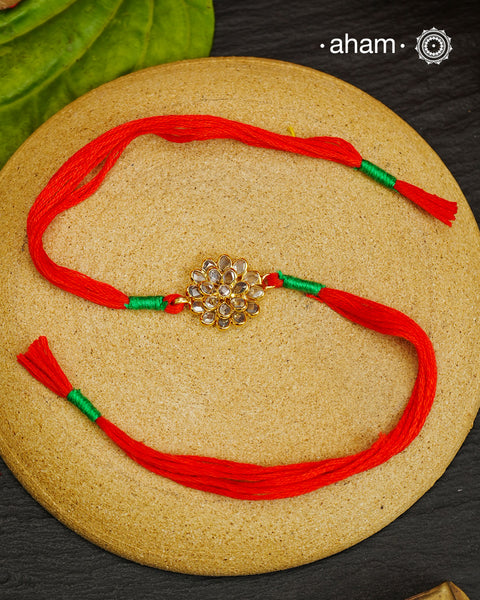 Zircon Flower Gold Polish Silver Rakhi