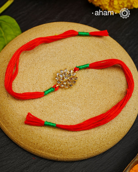 Zircon Flower Gold Polish Silver Rakhi