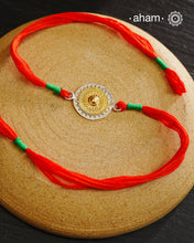 Surya Two Tone Silver Handcrafted Rakhi And Lumba Set