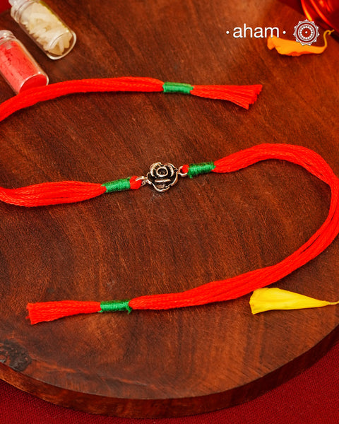 Beautiful Flower Rakhi crafted in 92.5 silver.
Make this Rakshabandhan Memorable with this handcrafted Rakhi for an ever-lasting Knot and the Eternal protection of Lord Shiva.