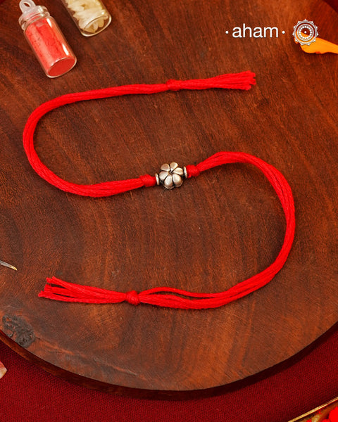 Flower Bead Silver Rakhi