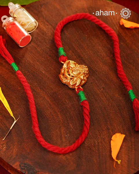 Nakshi Peacock Gold Polish Silver Rakhi