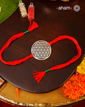 Beautiful Silver Rakhi
Make this Rakshabandhan Memorable with this handcrafted Rakhi Silver dial weaved with cotton thread for an ever-lasting Knot.Roli and Akshat (kumkum chawal) shipped along with India orders only